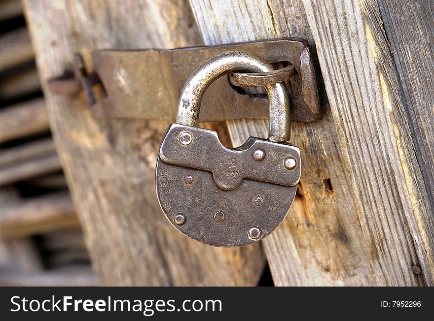 Metal Lock On Wooden Door