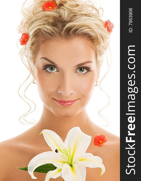 Beautiful young woman with lily flower