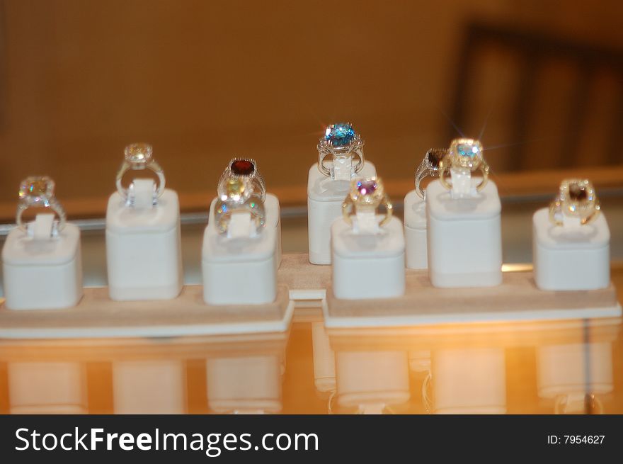 Different rings are displayed in their individual cases.