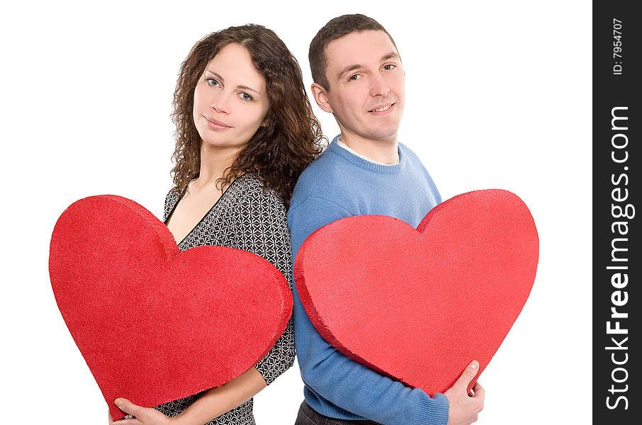 Loving couple holding hearts isolated over white background