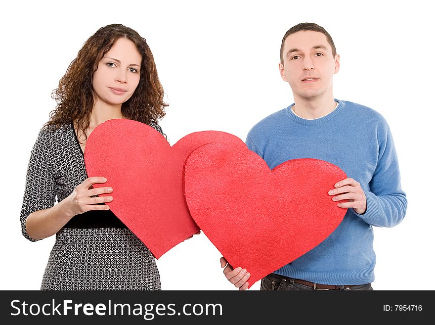 Loving couple holding hearts together isolated over white background