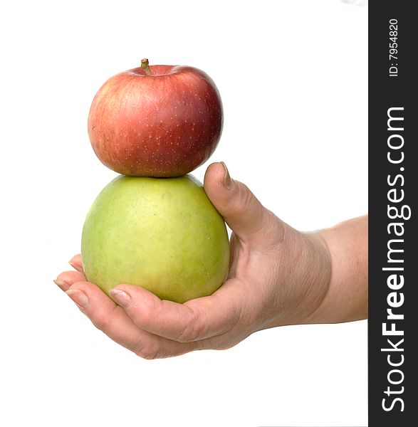 Hand with green and red apples isolated on white background