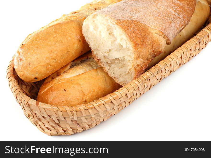 Basket of baguettes on a white background. Basket of baguettes on a white background.