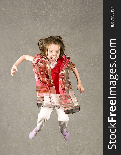 Little Girl Leaping Into Air