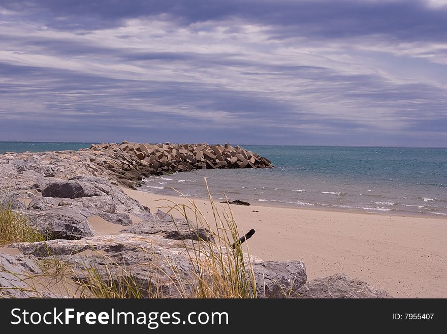French beach under cloudy sky