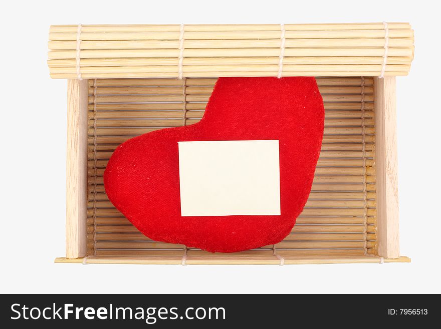 Bamboo box with heart on white background