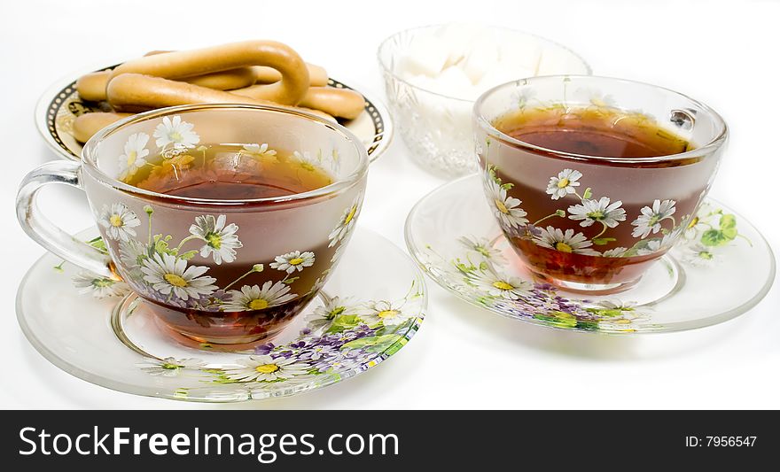 Two Tea Cups On A Saucer