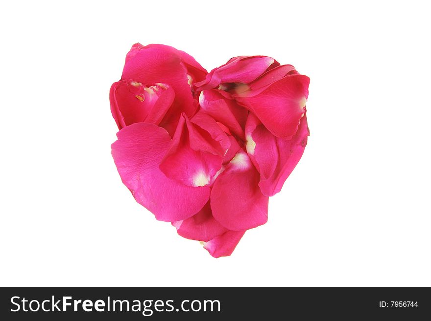 Red rose petals form a heart shape. Red rose petals form a heart shape