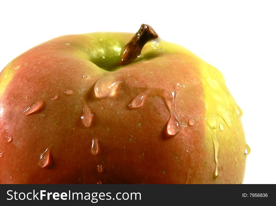 Close up of red apple with water drops