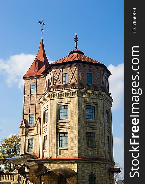 Brick building with a wooden tower