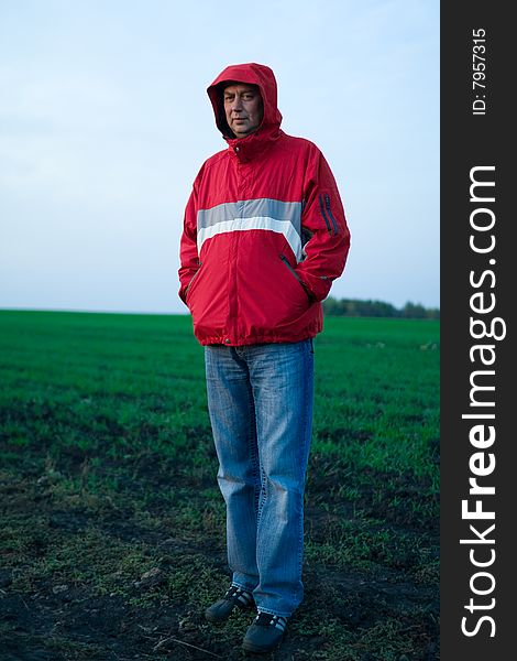 Portrait of man in red jacket outdoors. Portrait of man in red jacket outdoors
