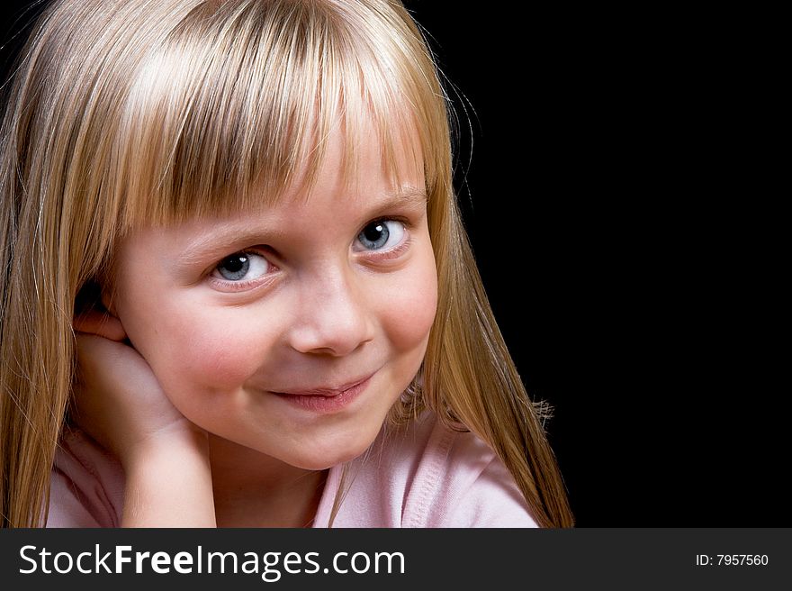 Blond Girl with big blue eyes on a black background