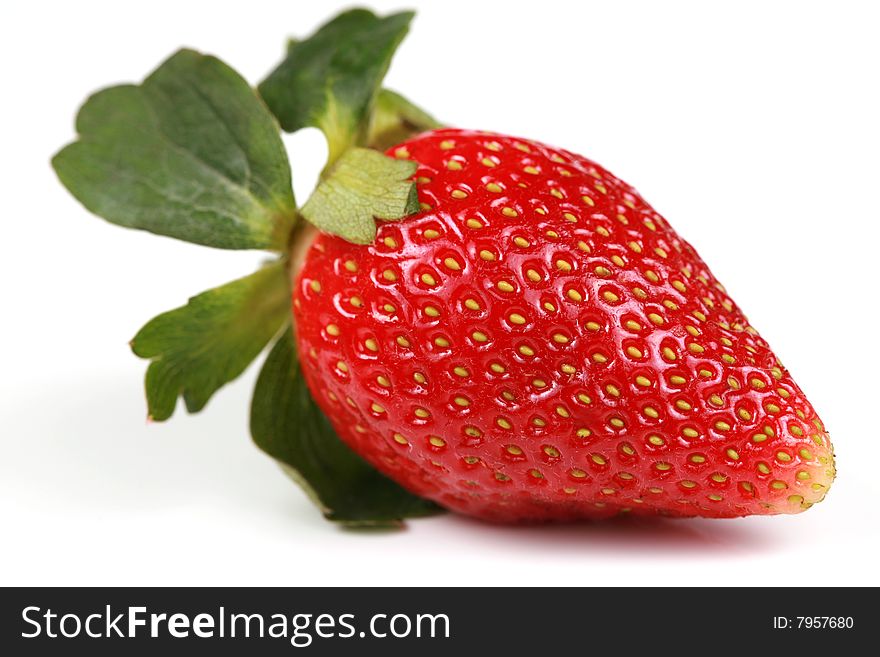 One delicious red strawberry isolated. One delicious red strawberry isolated