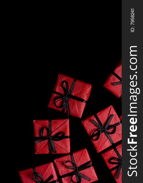 Many red gift boxes on black background