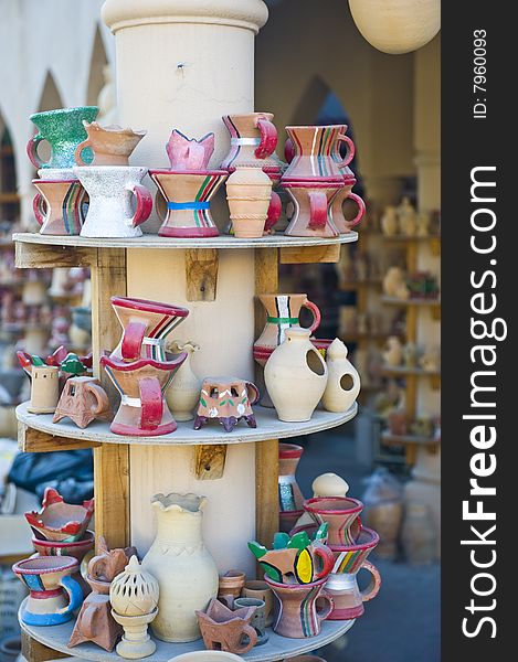 A traditional Arabian market in Nizwa, Oman, with clay or ceramic water pots and incense burners from the renowned village of Bahla. A traditional Arabian market in Nizwa, Oman, with clay or ceramic water pots and incense burners from the renowned village of Bahla.