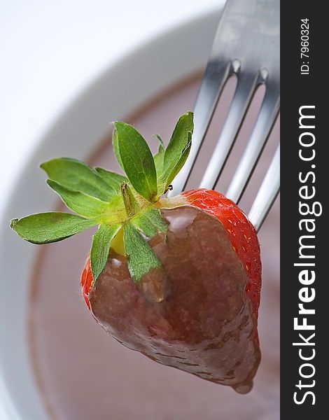 Fresh natural strawberry and chocolate with milk isolated