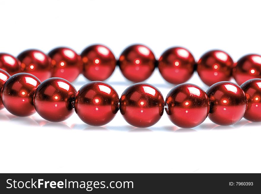 Purple pearls isolated on white background.