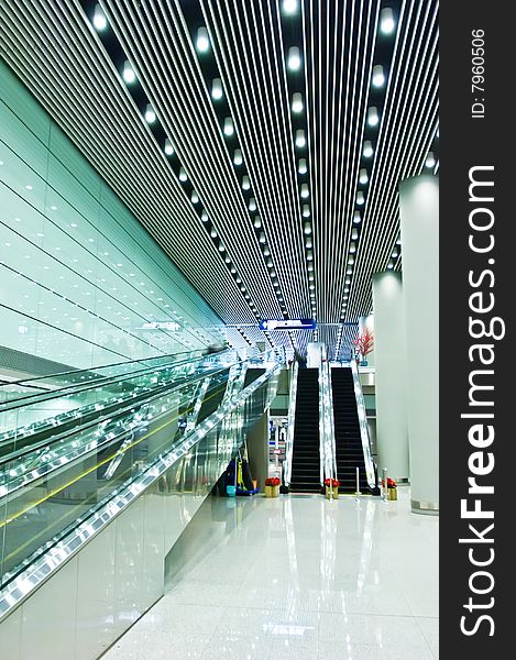 Escalators in modern hall of T3 airfield beijing.