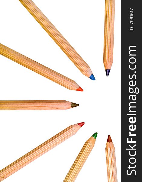 Colored pencils isolated over a white background