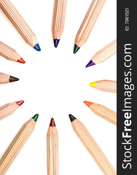 Colored pencils isolated over a white background