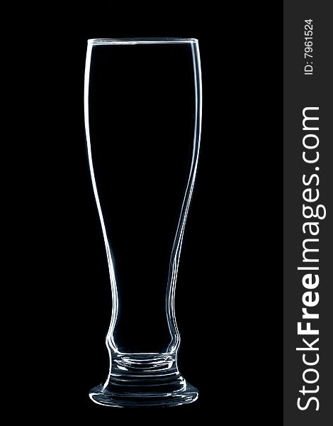 Empty glass of beer isolated over black background