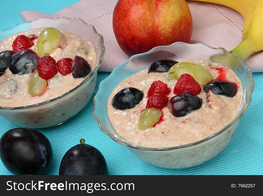 Fruit yogurt with fresh fruit on plate