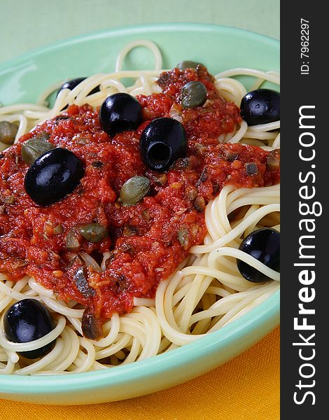 Pasta with tomato sauce on plate