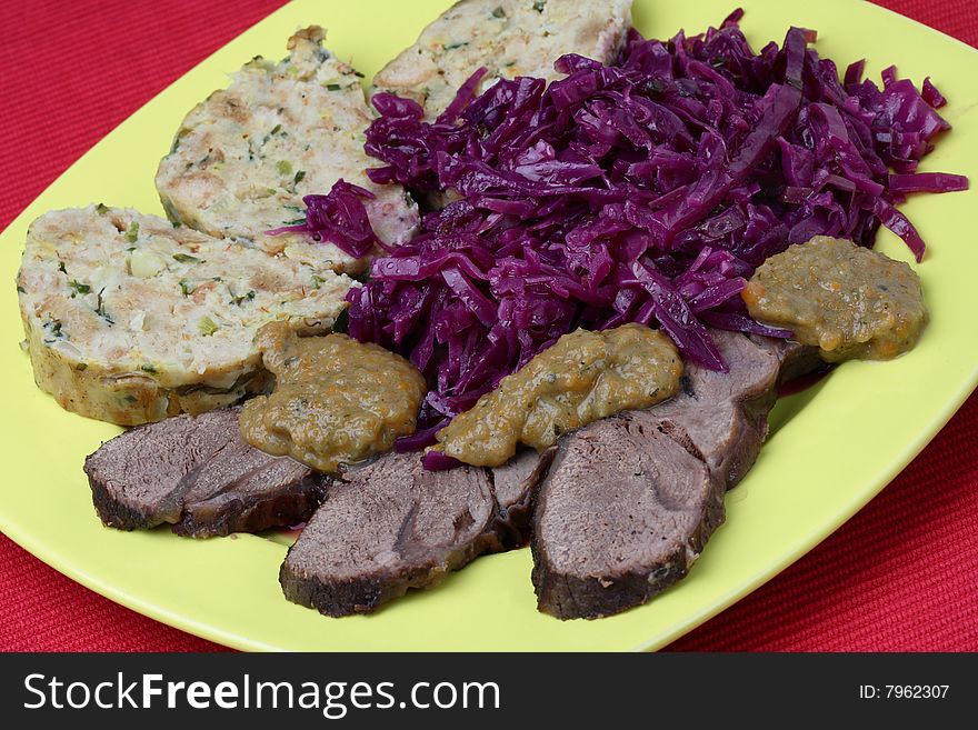 Venison meat with bread and vegetable