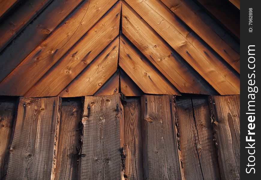 Old smokehouse, wood planks symmetrical background. Old smokehouse, wood planks symmetrical background