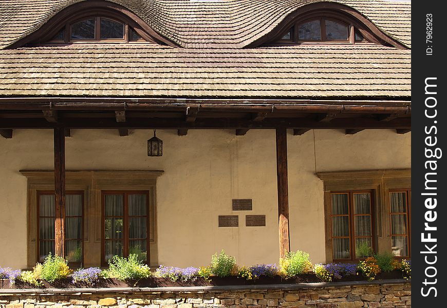 Old house and flowers in south Poland - Beskidy.