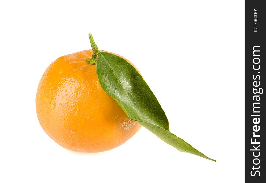 Orange tangerine with leaf on white ground