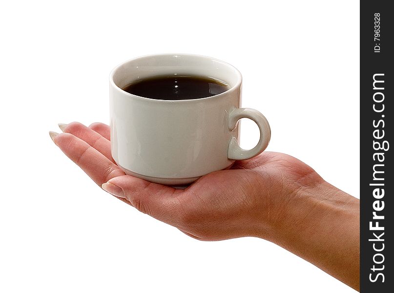 Women's hand holding a cup of coffee. Isolated on a white background, the image contains clipping path. Women's hand holding a cup of coffee. Isolated on a white background, the image contains clipping path.