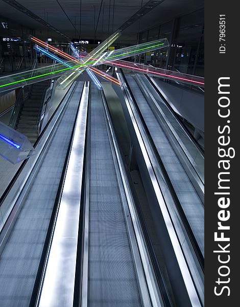 Three ways escalator in blue tone at Zurique Airport. Three ways escalator in blue tone at Zurique Airport