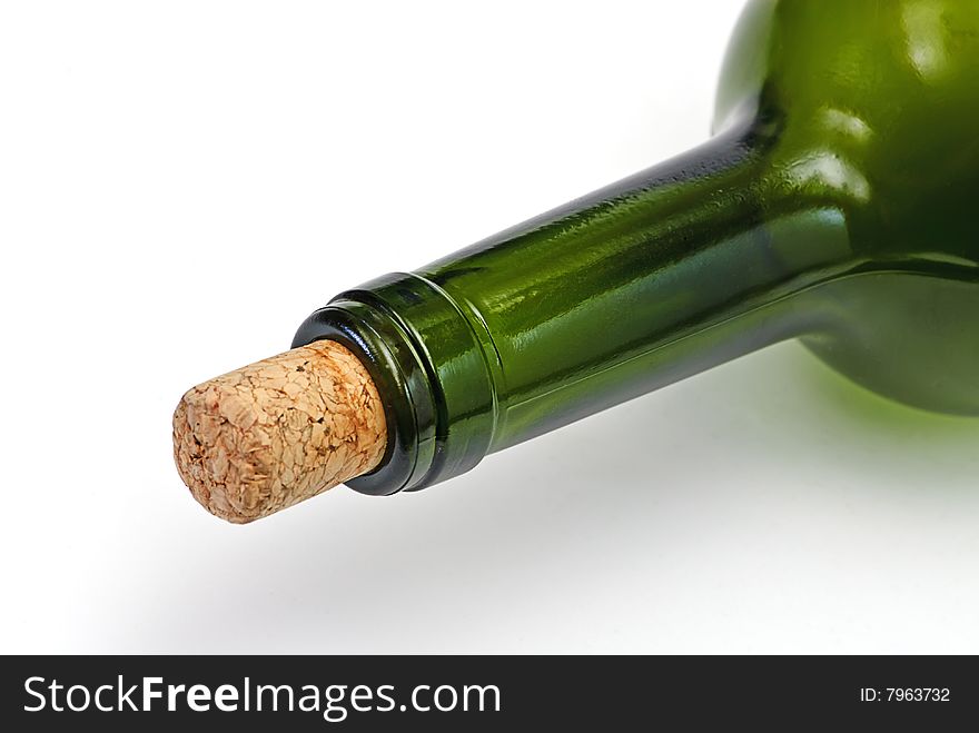 Bottle with  cork isolated on white