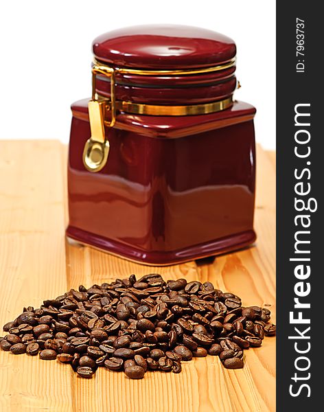 Beans coffee and box  on wooden table. Beans coffee and box  on wooden table