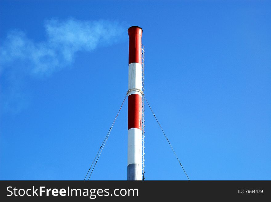 Chimney isolated on blue sky. Chimney isolated on blue sky