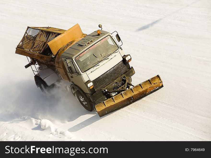 Snow buldoser on the road