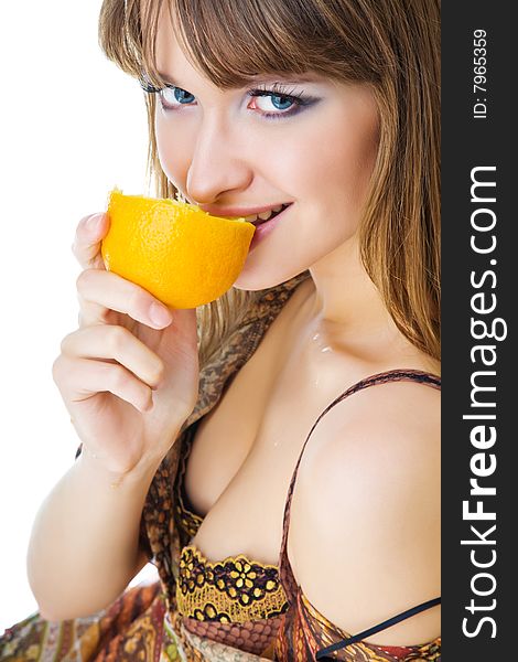 Attractive young woman with orange isolated