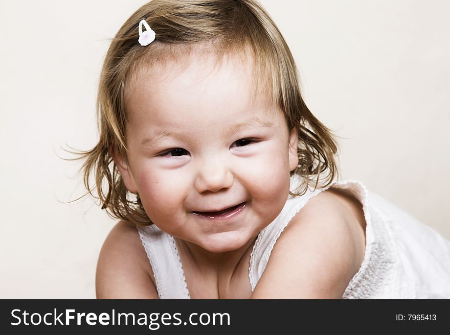 Little girl with short hair and beautiful facial expressions