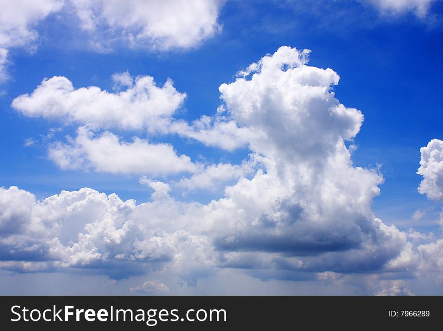 Cloudy blue sky on a sunny day. Cloudy blue sky on a sunny day.