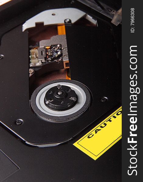 Close-up of a dvd optical drive and laser head . Close-up of a dvd optical drive and laser head .