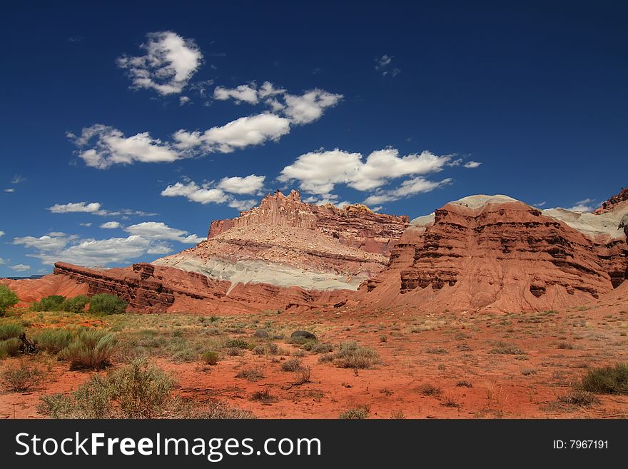 View of the red rock formations in Capitol Reef National Park with blue sky�s and clouds