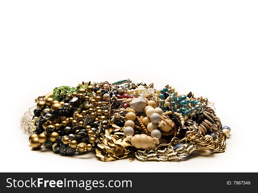 Mound of vintage jewelries isolated in white backgrond.