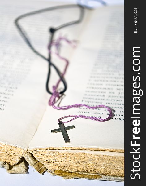 Religion concept.Book and cross