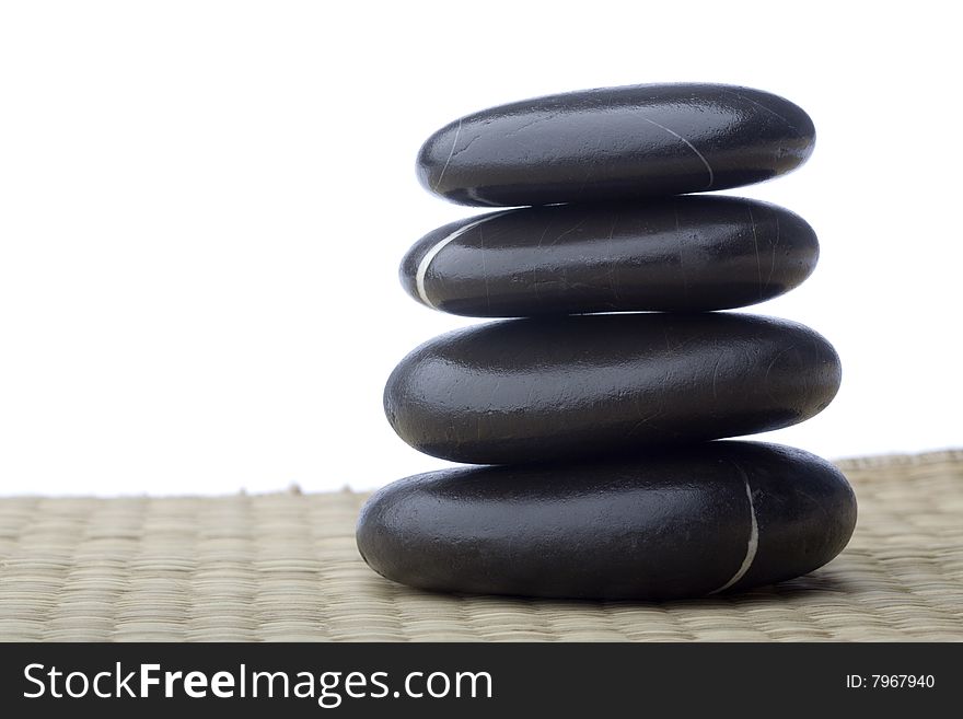 Stone tower on white background