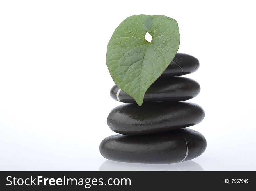 Stone tower on white background