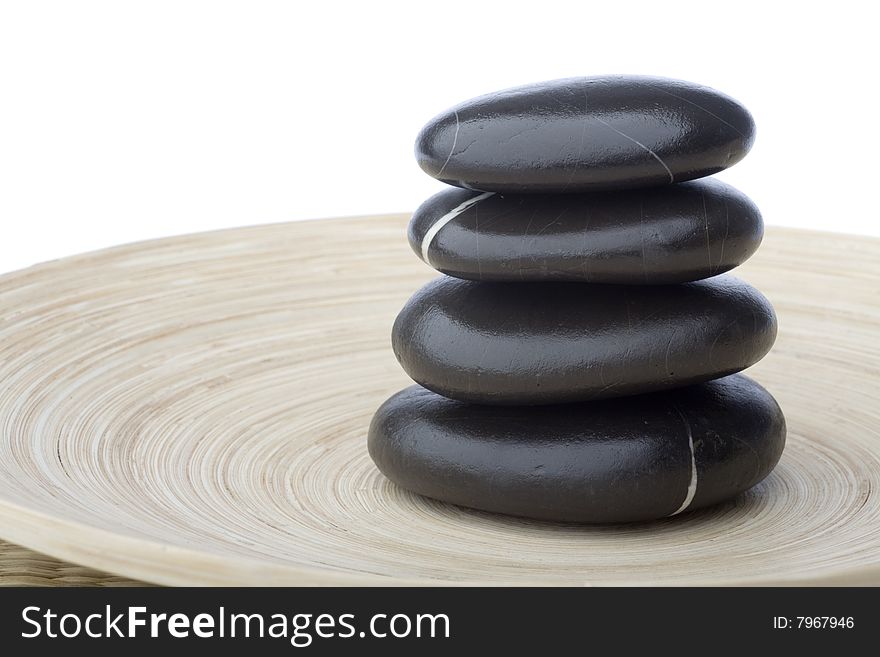 Stone tower on white background