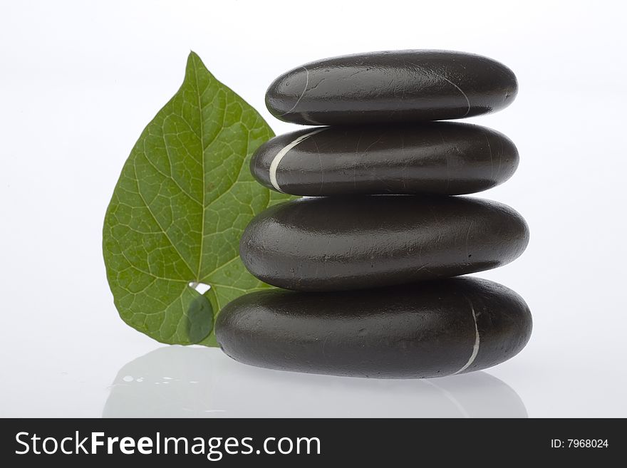 Stone tower on white background