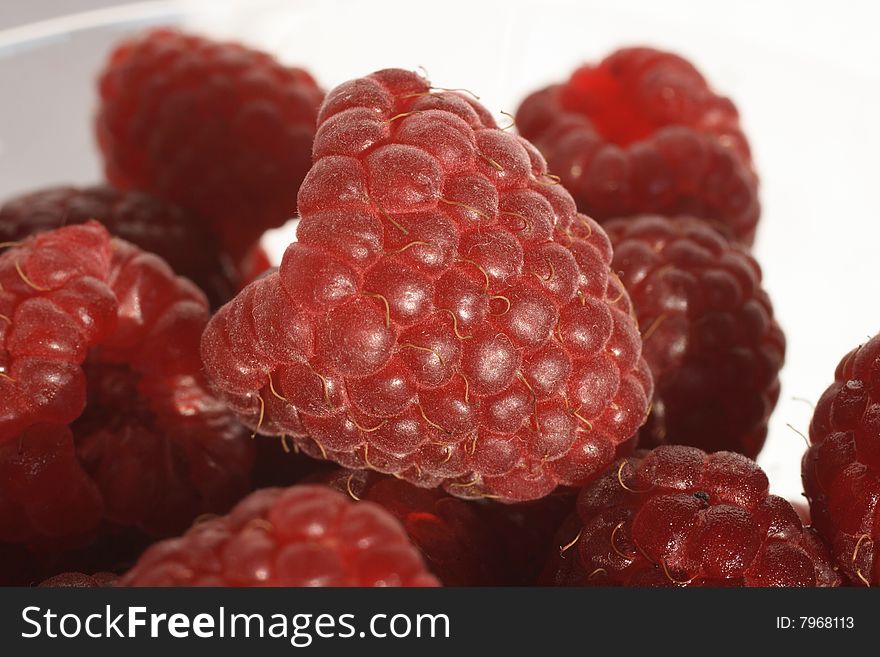 Background with fresh red raspberries