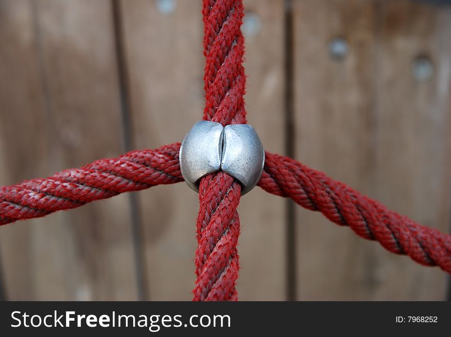 Ropes for children's playground in the woods on a board